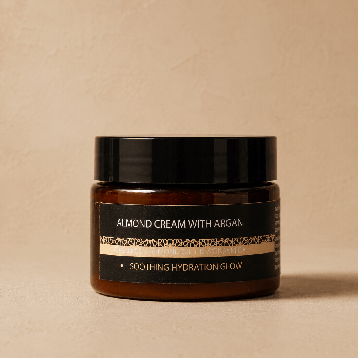 Jar of almond cream with argan on a beige background